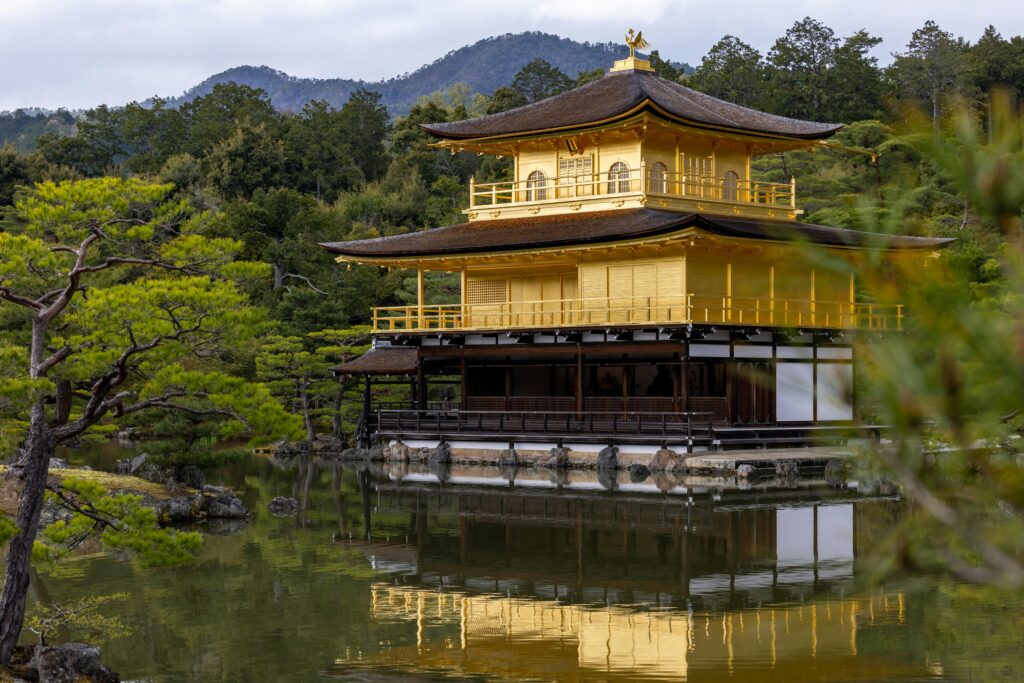 Kinkaku-ji, the Golden Pavilion, reflecting on a pond in Kyoto 
